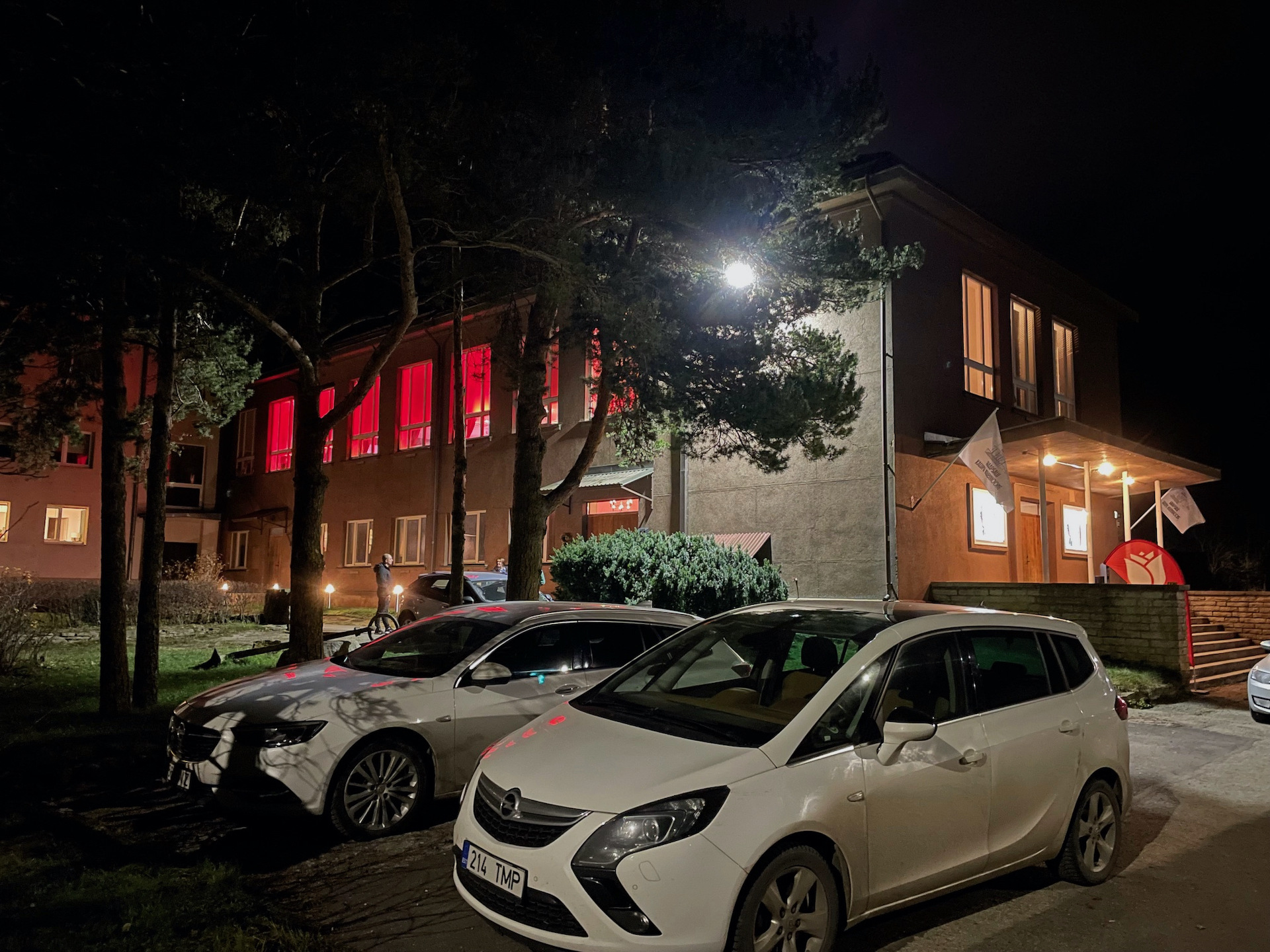 Fishermen's Club building exterior view and spacious parking lot