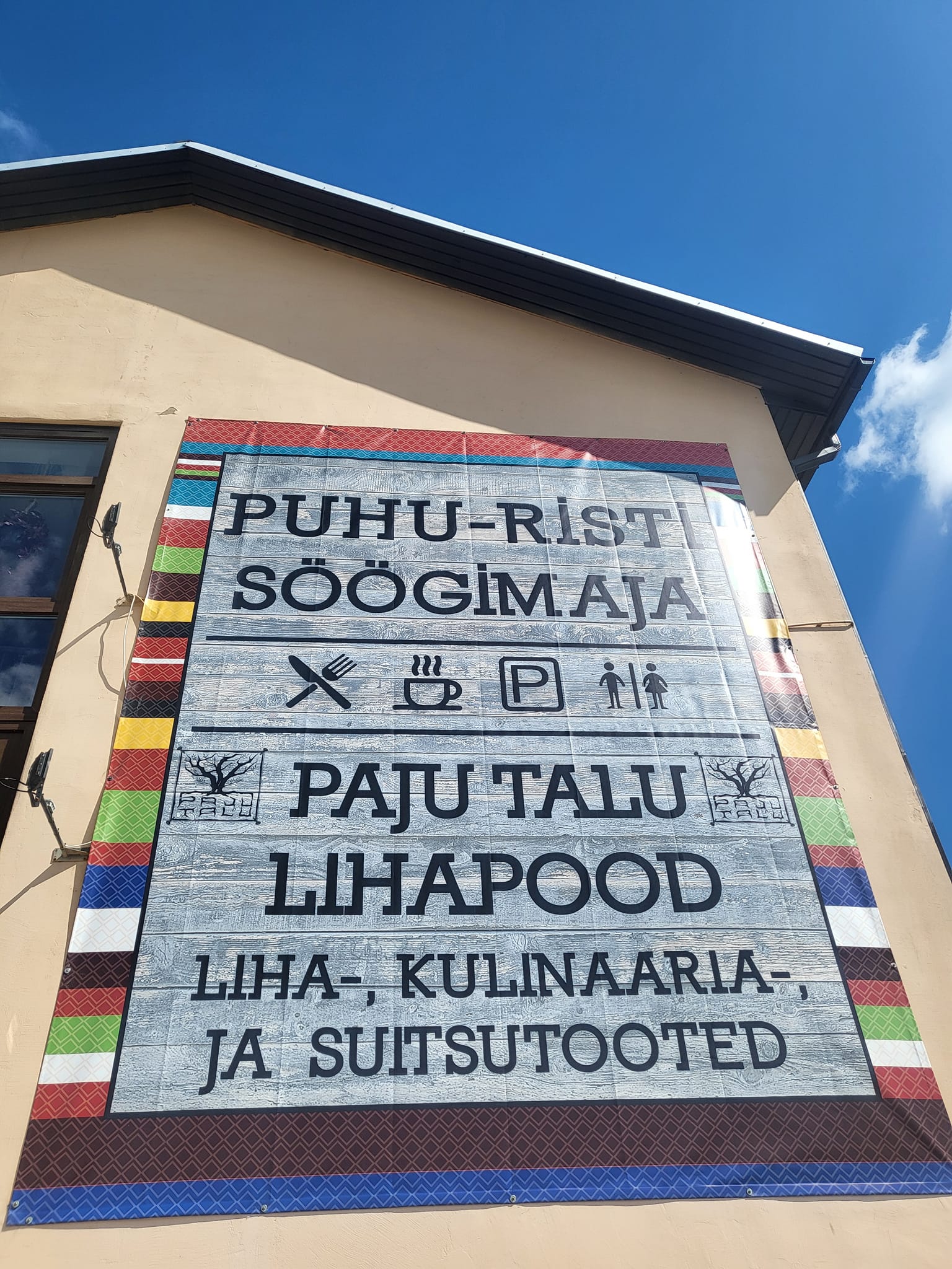 Puhu-Risti Söögimaja silt maja peal