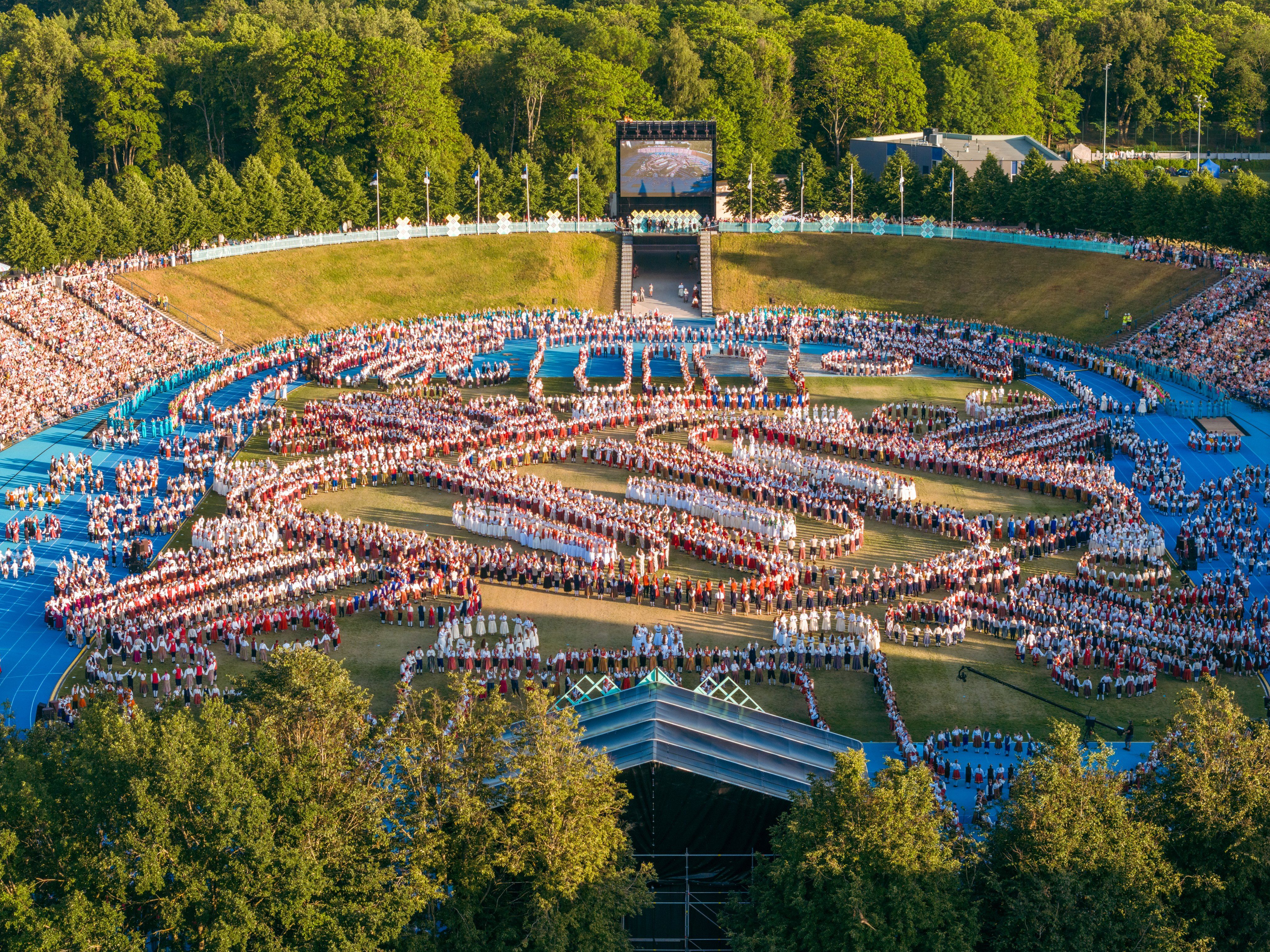 Folk dancers at the stadium