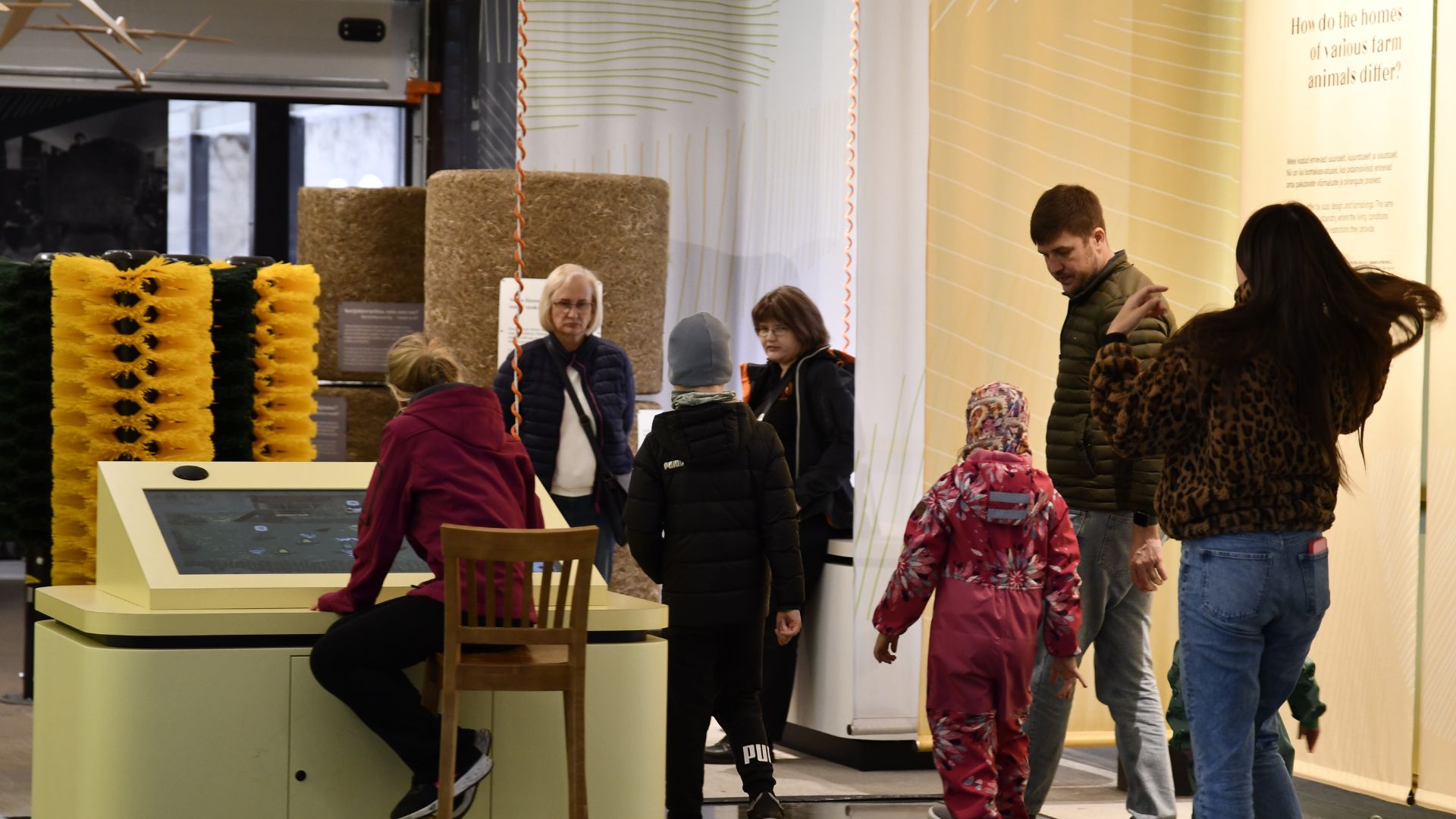 Visitors to the Ülenurme Rural Curiosity Center play an interactive game on chickens