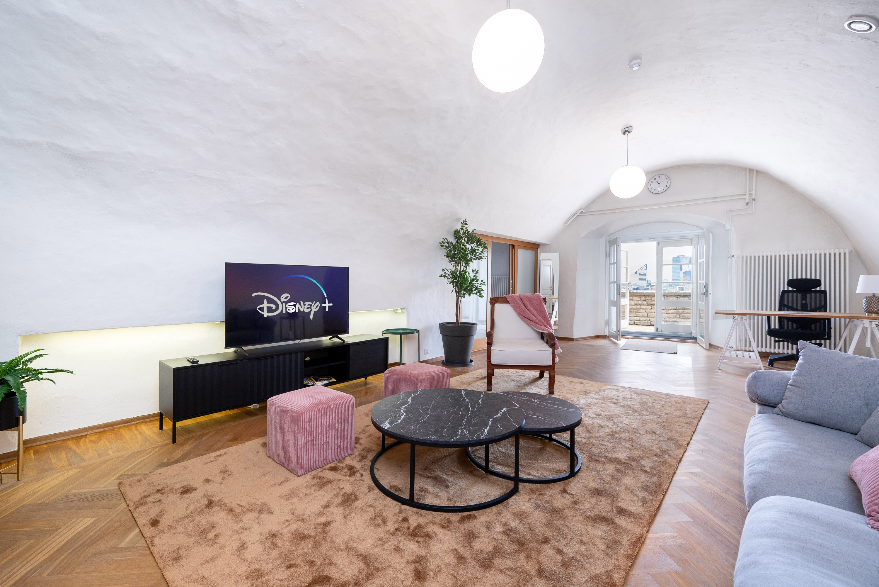 Modern-furnished living room in T64 guest apartment