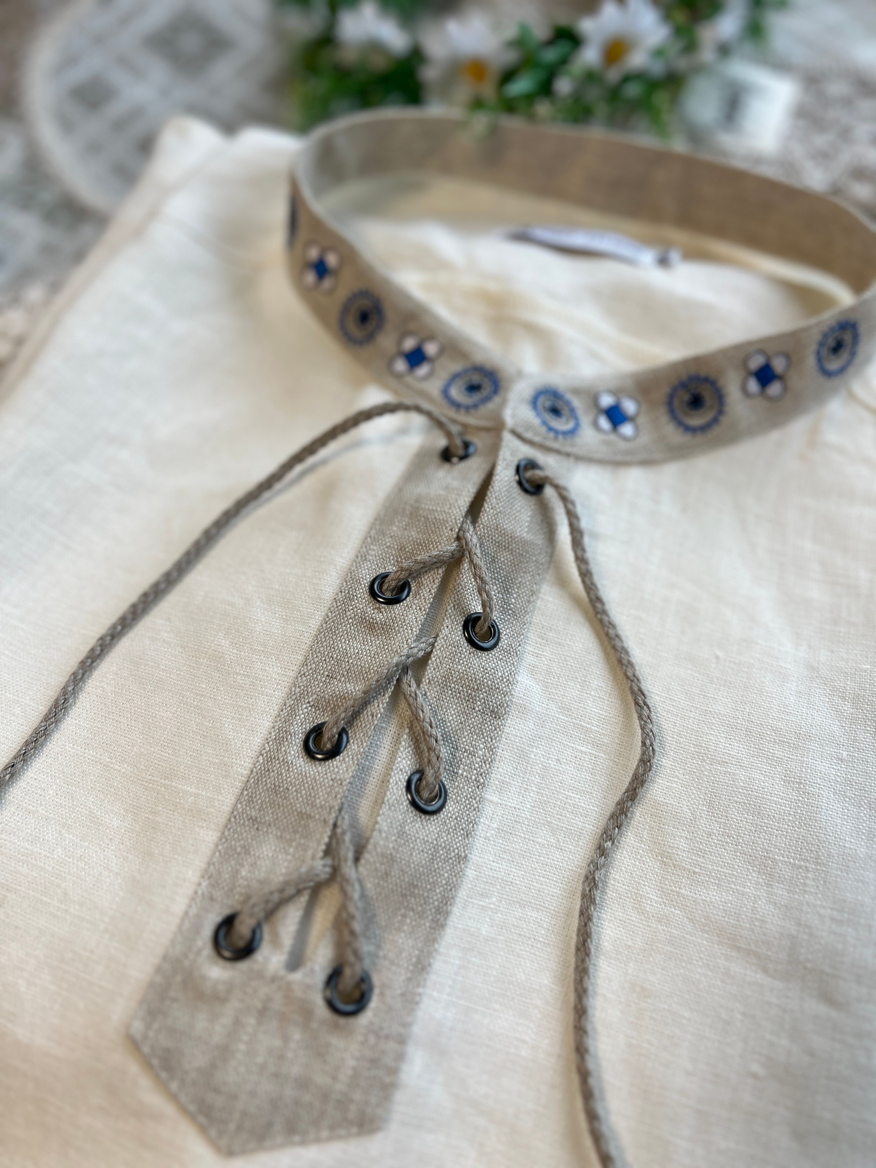 Linast meeste valge pluus, kokkuvoldituna