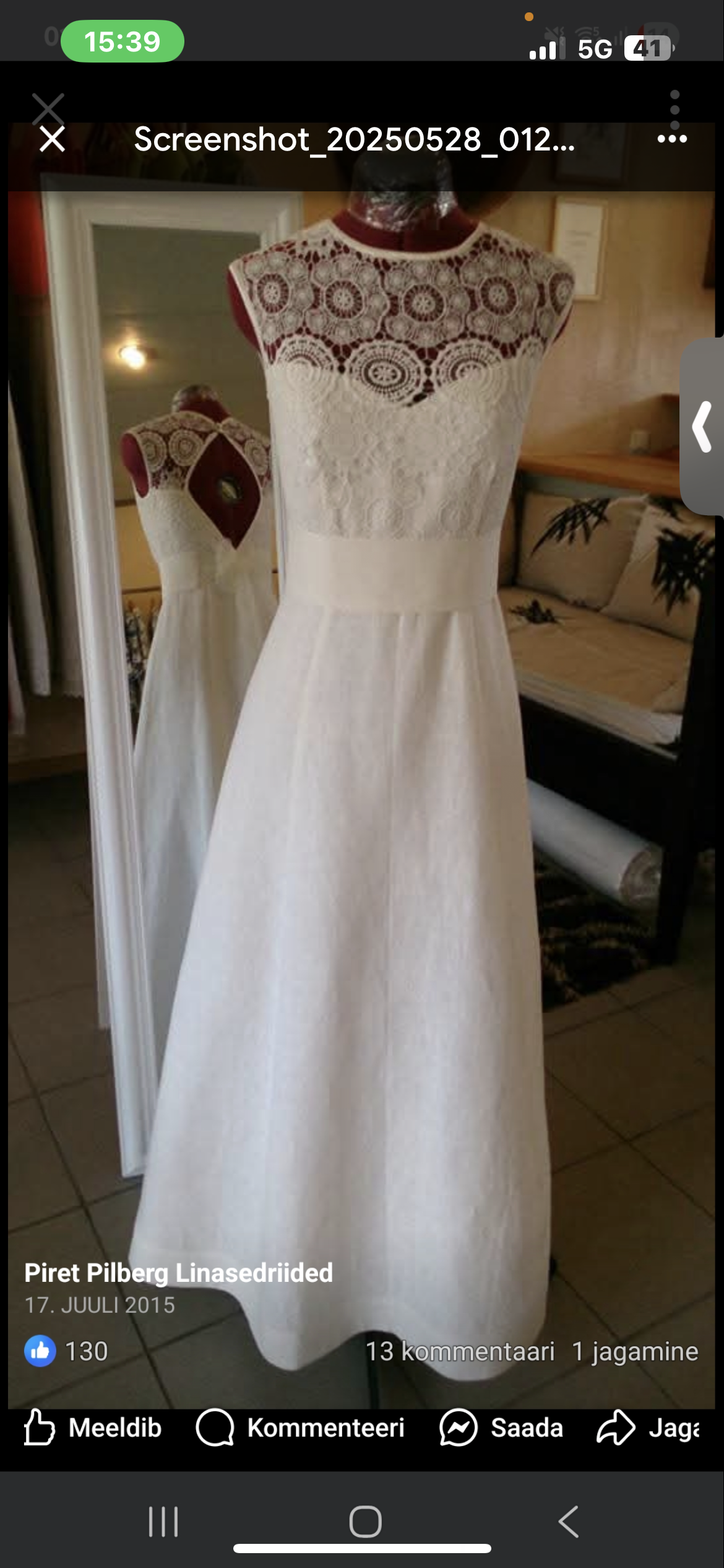 Linast valge pruutkleit mannekeeni seljas