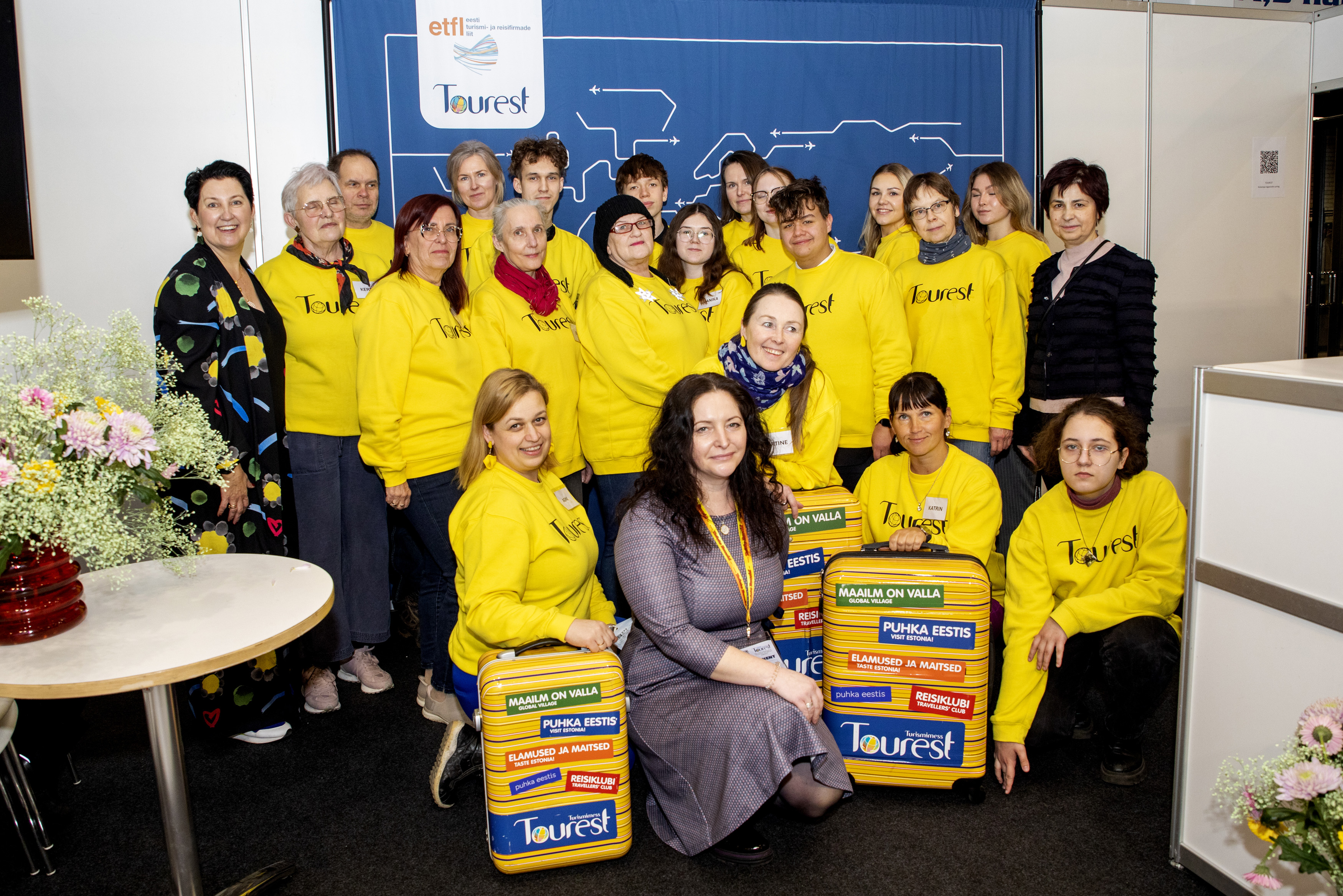 Organisatoren der Tourest in gelben Pullovern