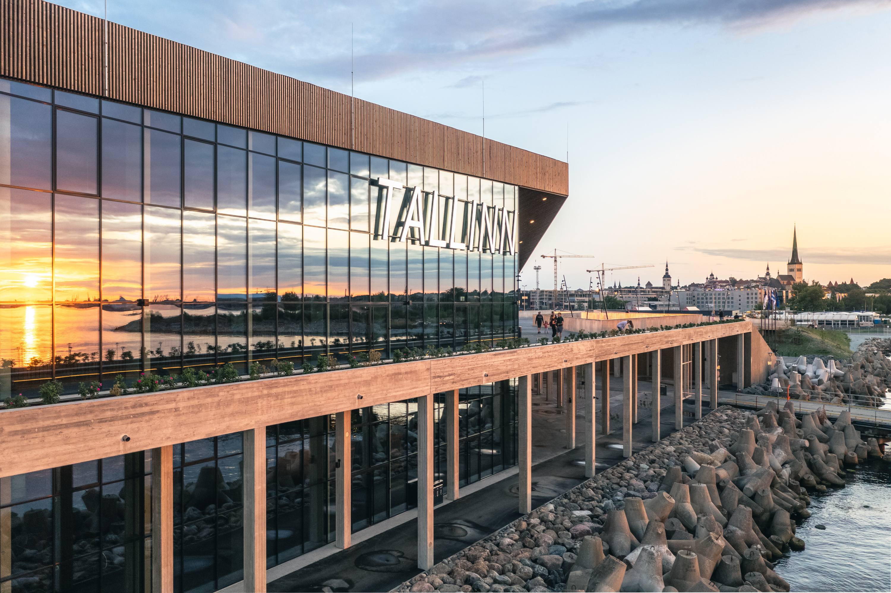 Tallinn letter cruise terminal glass facade at sunset
