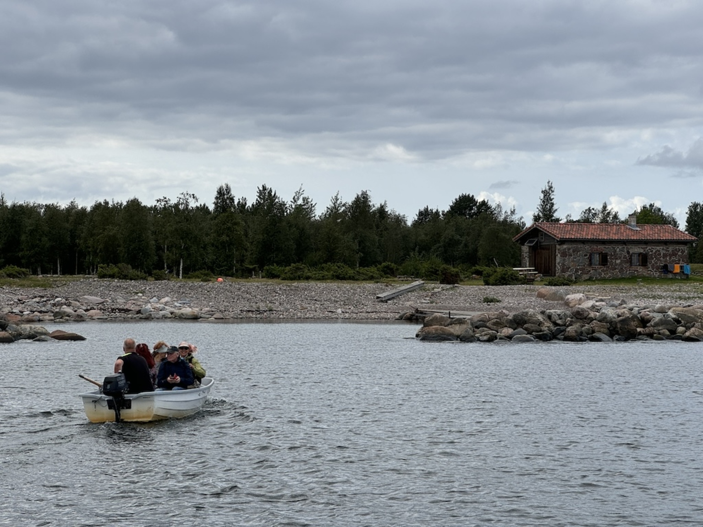 Landing on Aksi Island with a rowing boat