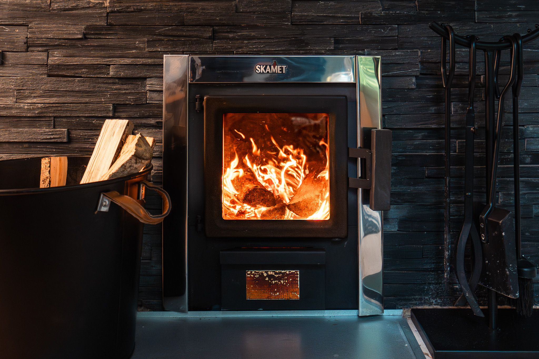 Heating the sauna by the bog lake