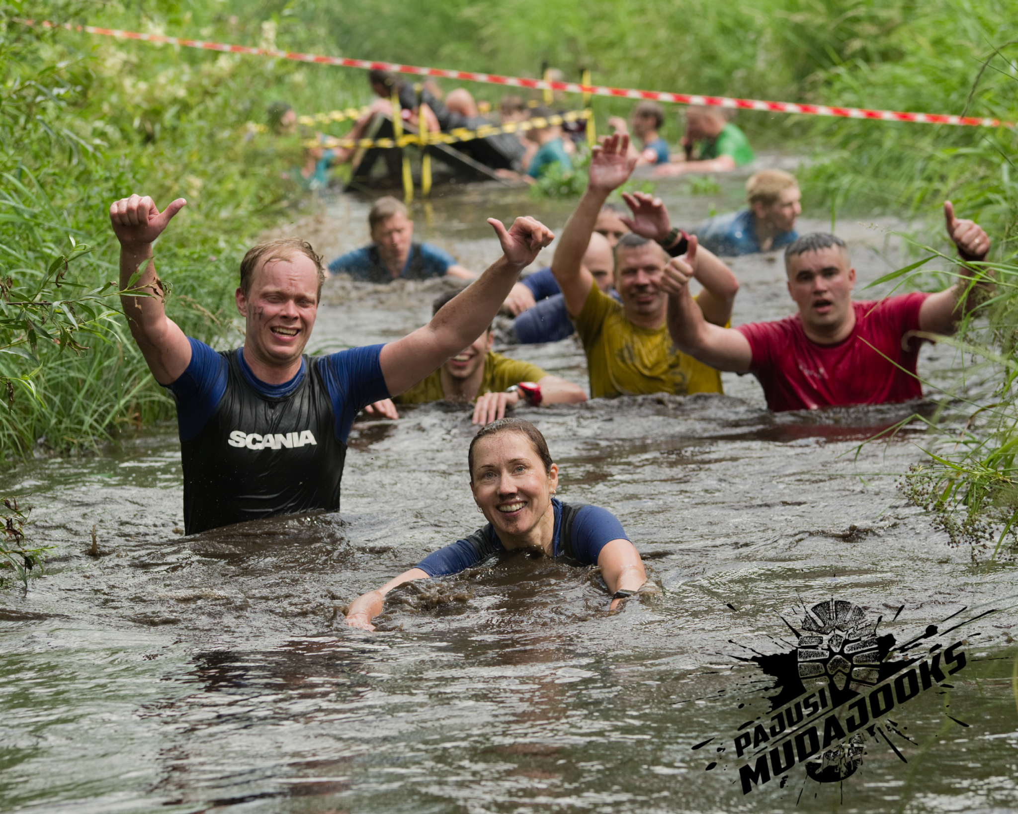 Happy competitors at Pajusi Mud Run