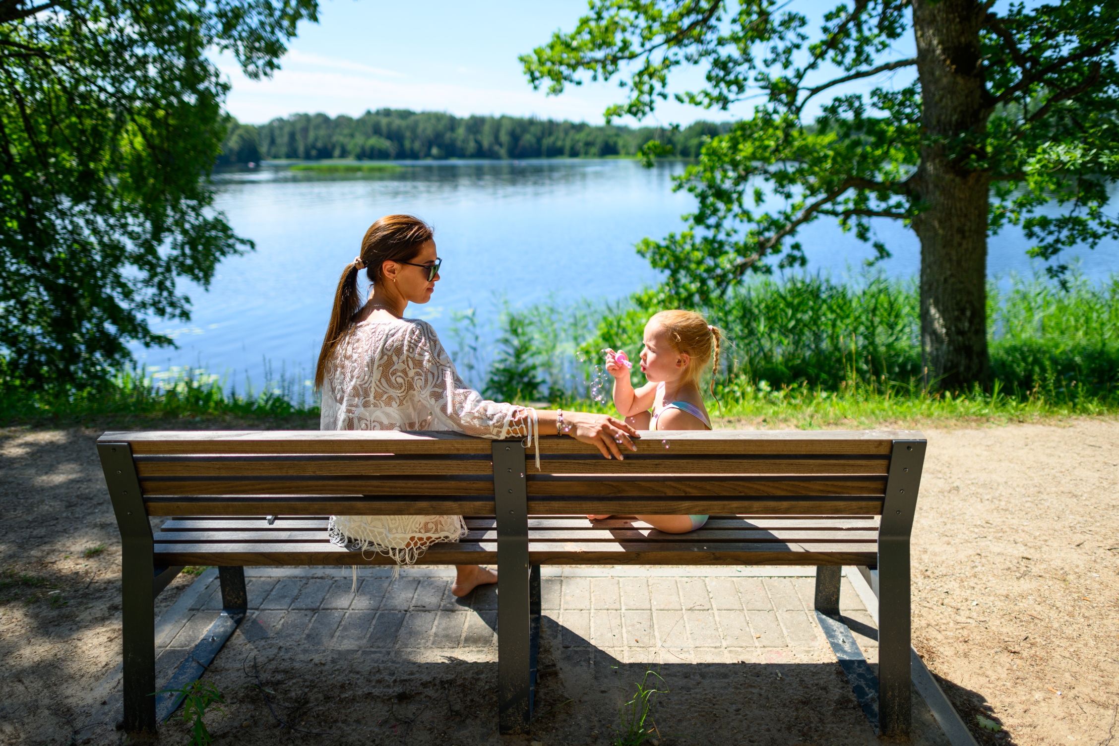 Relaxing moment by Lake Pühajärve on a park bench