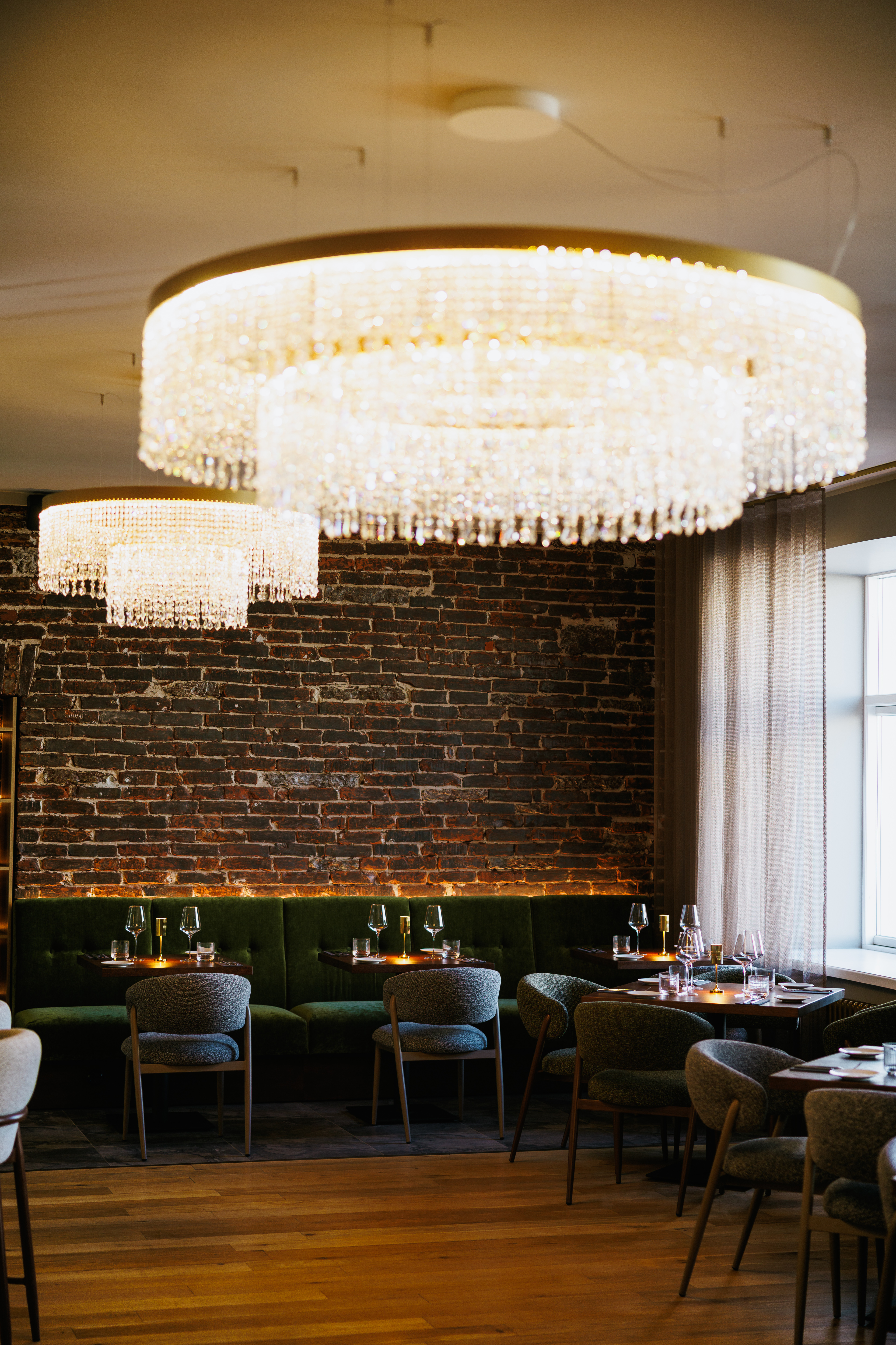 Como Restaurant dining hall with crystal chandeliers