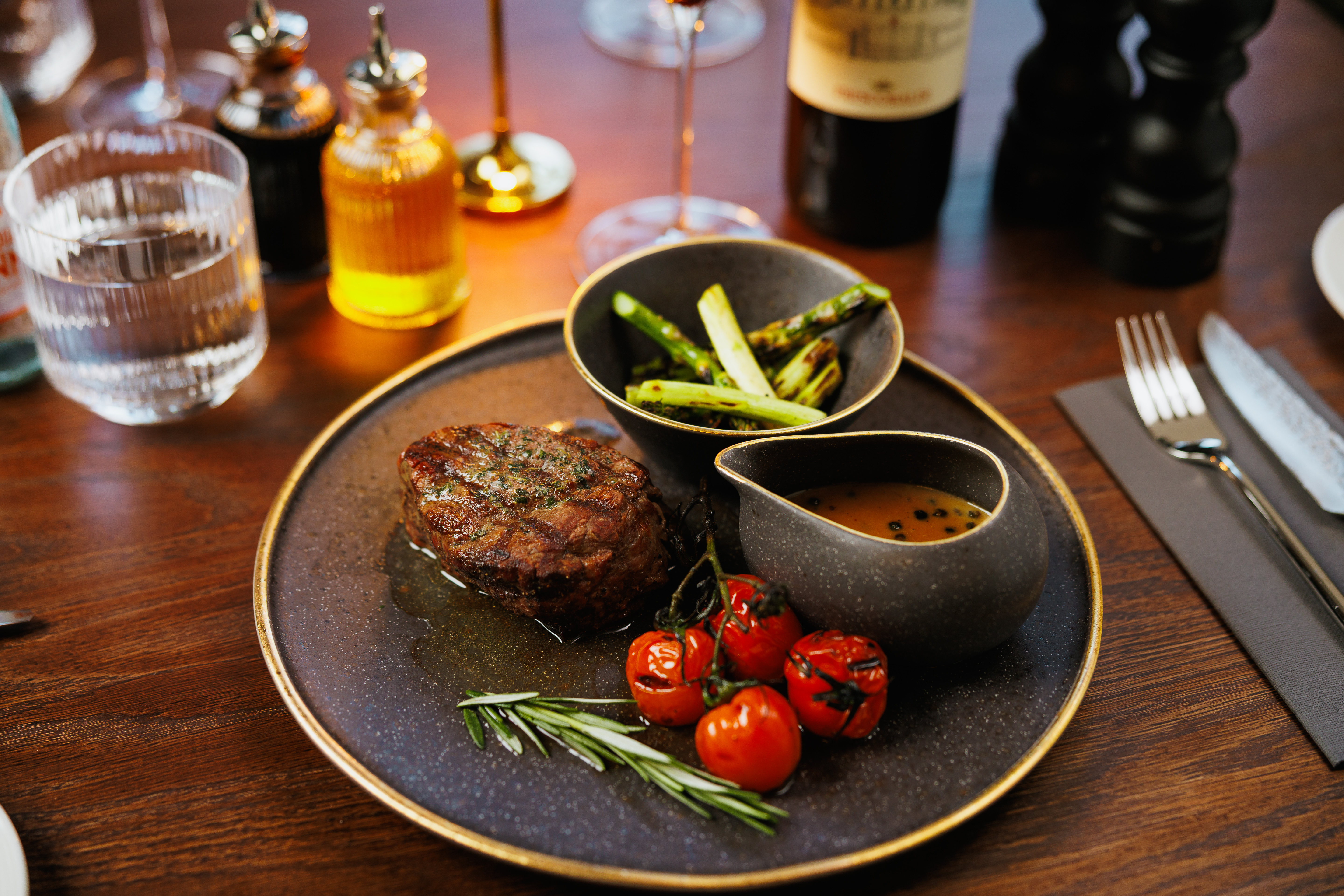 Grilled beef fillet with asparagus and sauce at Como Restaurant