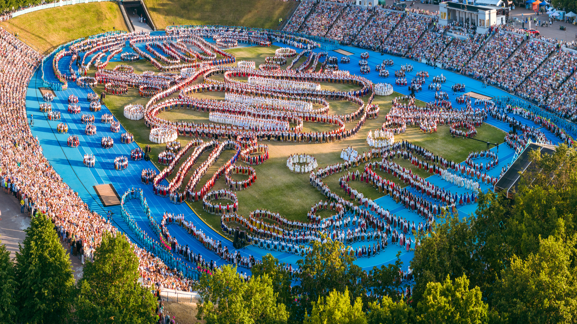 Aerial view of the audience and dancers at Tallinn Kalev Stadium